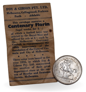 1934/35 Melbourne Centenary Florin UNC with Foys Bag aVF